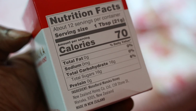 nutrition label for a manuka honey package showing its sugar content